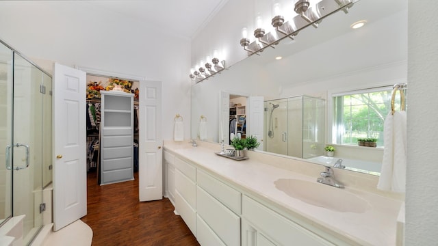 253 Valtie Davis Rd, Combine, TX 75159 - full bath featuring a shower stall, crown molding, vanity, wood finished floors, and a walk in closet