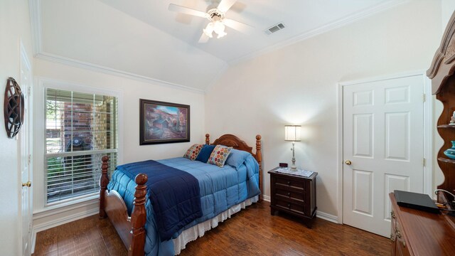 253 Valtie Davis Rd, Combine, TX 75159 - bedroom with vaulted ceiling, crown molding, dark wood finished floors, baseboards, and a ceiling fan