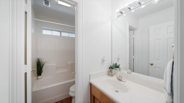 253 Valtie Davis Rd, Combine, TX 75159 - bathroom with toilet, vanity, ornamental molding, and  shower combination