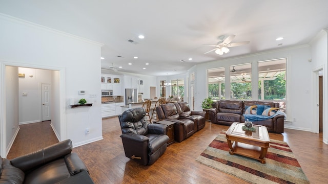 253 Valtie Davis Rd, Combine, TX 75159 - living area with ceiling fan, crown molding, recessed lighting, wood finished floors, and baseboards