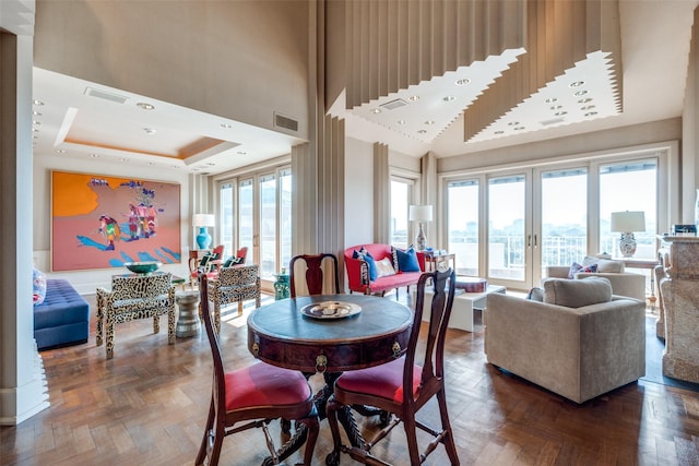 4500 Roland Ave Unit 801, Highland Park, TX 75219 - dining area featuring a tray ceiling, french doors, and a high ceiling