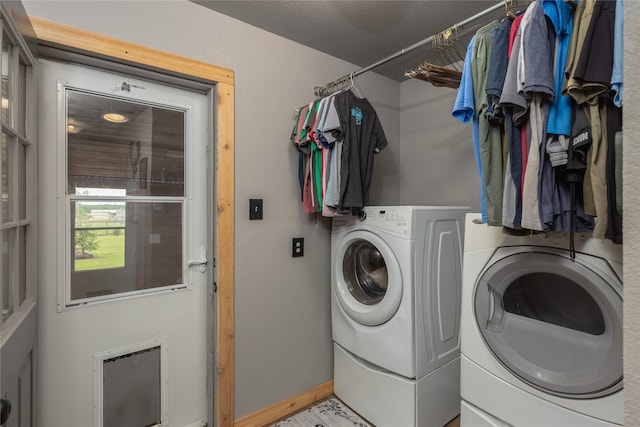 2405 Poolville Cut Off Rd, Poolville, TX 76487 - clothes washing area with separate washer and dryer and baseboards