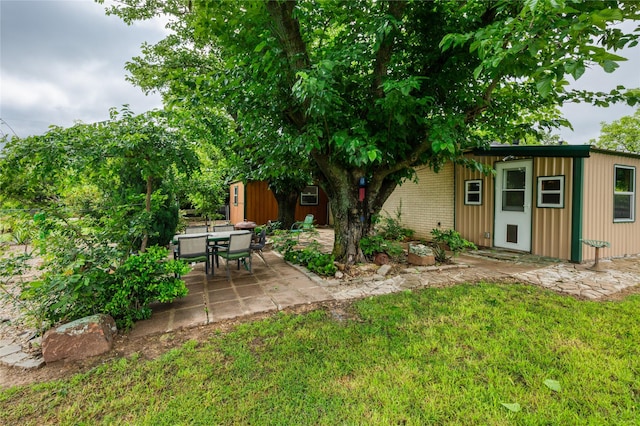 2405 Poolville Cut Off Rd, Poolville, TX 76487 - view of green lawn with a patio