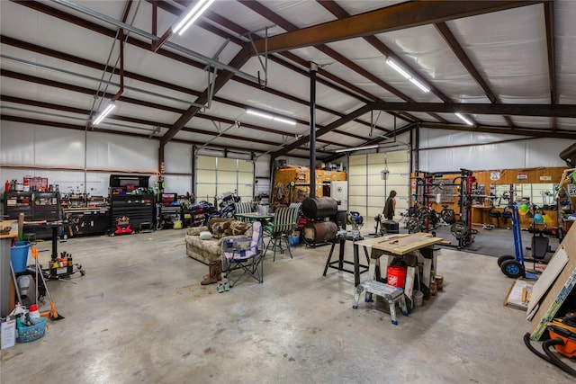 2405 Poolville Cut Off Rd, Poolville, TX 76487 - garage featuring a workshop area