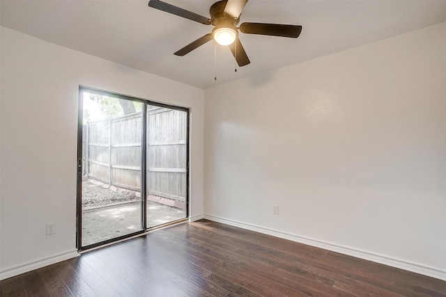 2204 Mediterranean Ave, Arlington, TX 76011 - spare room featuring dark wood-type flooring, a ceiling fan, and baseboards