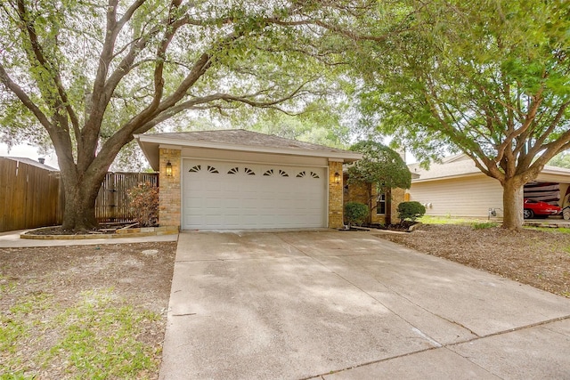 2204 Mediterranean Ave, Arlington, TX 76011 - single story home featuring brick siding, driveway, fence, and a garage