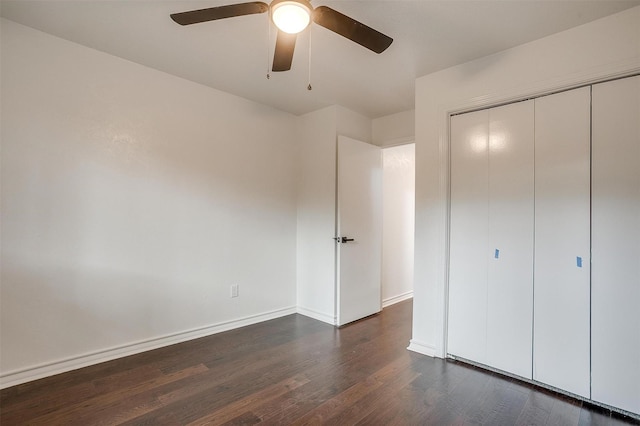 2204 Mediterranean Ave, Arlington, TX 76011 - unfurnished bedroom with dark wood finished floors, a closet, baseboards, and ceiling fan