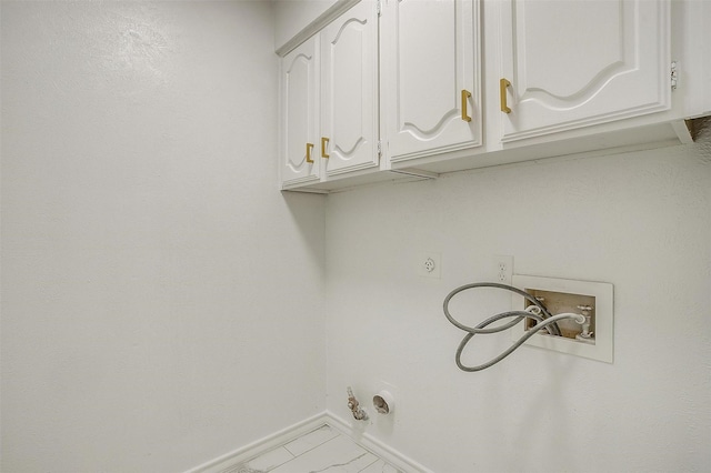 2204 Mediterranean Ave, Arlington, TX 76011 - clothes washing area featuring hookup for a washing machine, cabinet space, electric dryer hookup, hookup for a gas dryer, and baseboards