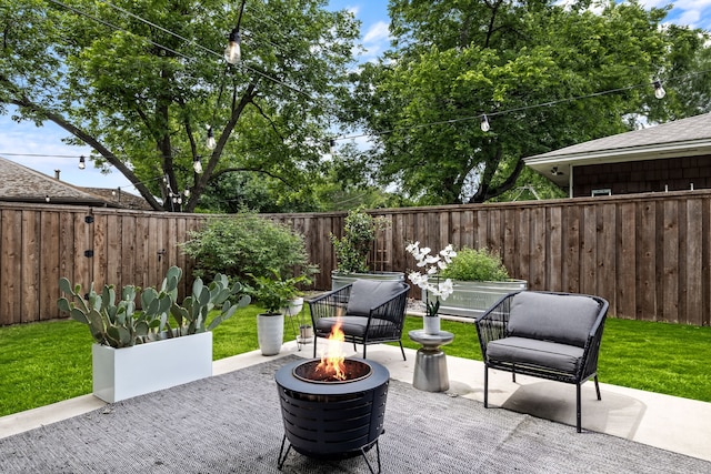 9115 Longmont Dr, Dallas, TX 75238 - view of patio / terrace with an outdoor fire pit