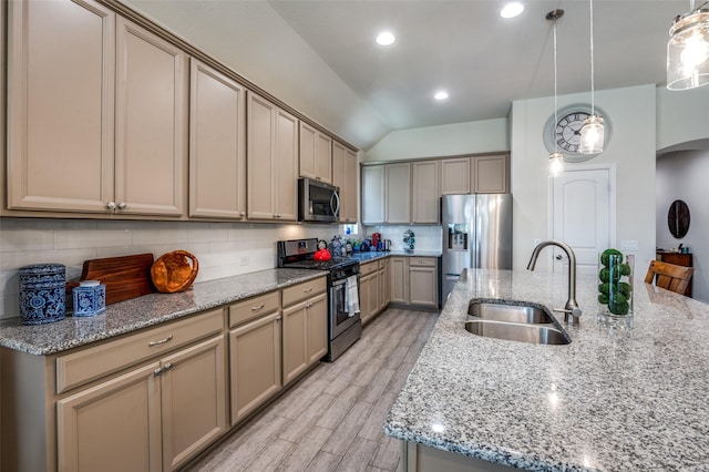 5312 Leyton Dr, Mckinney, TX 75071 - kitchen with stainless steel appliances, a sink, arched walkways, tasteful backsplash, and lofted ceiling