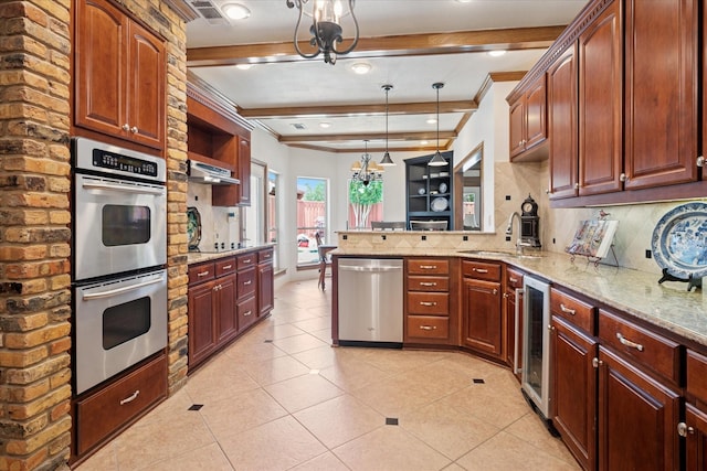 3517 Louis Dr, Plano, TX 75023 - kitchen featuring stainless steel appliances, a sink, wine cooler, a chandelier, and a peninsula