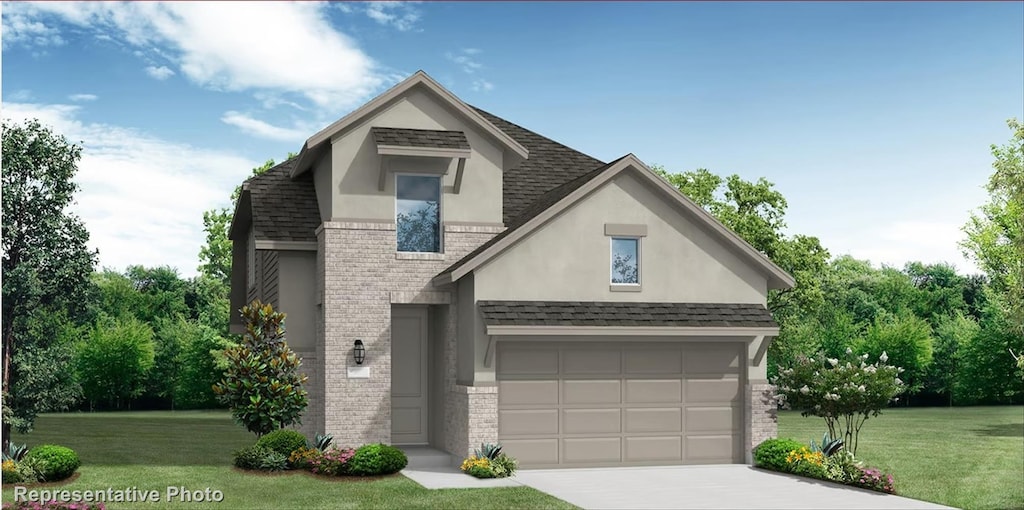 4113 Beale St, Heartland, TX 75114 - view of front of property featuring brick siding, stucco siding, concrete driveway, and a front yard