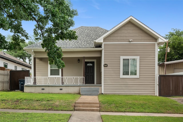 2721 Ave G, Fort Worth, TX 76105 - view of front facade with a porch and roof with shingles