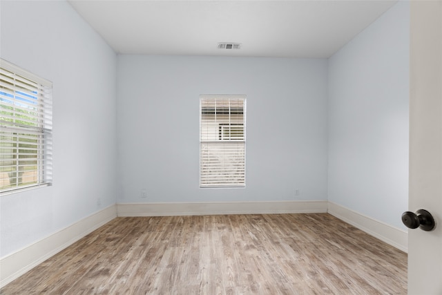2721 Ave G, Fort Worth, TX 76105 - empty room with light wood finished floors and baseboards