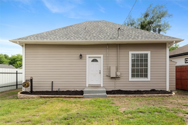 2721 Ave G, Fort Worth, TX 76105 - rear view of house featuring a shingled roof