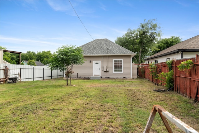 2721 Ave G, Fort Worth, TX 76105 - back of property featuring entry steps and a shingled roof