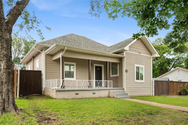 2721 Ave G, Fort Worth, TX 76105 - view of front of house with a porch and a shingled roof