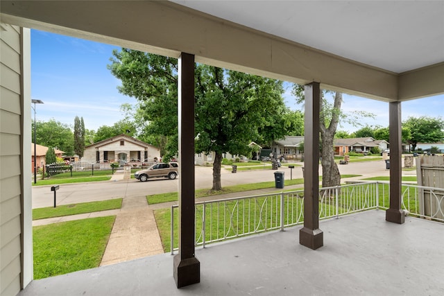 2721 Ave G, Fort Worth, TX 76105 - view of patio featuring a porch and a residential view