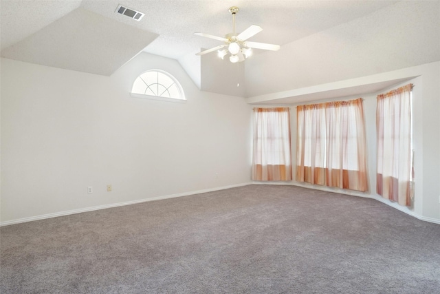 7104 Chandler Dr, Plano, TX 75024 - spare room with vaulted ceiling, a ceiling fan, carpet floors, and baseboards
