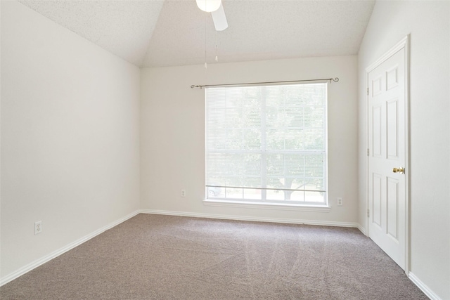 7104 Chandler Dr, Plano, TX 75024 - carpeted spare room with lofted ceiling, a ceiling fan, baseboards, and a textured ceiling