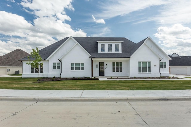 3316 Acorn Hill Trl, Weatherford, TX 76087 - modern inspired farmhouse with board and batten siding, a front yard, a shingled roof, and central air condition unit