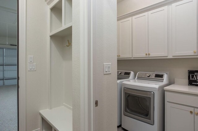 3316 Acorn Hill Trl, Weatherford, TX 76087 - clothes washing area with cabinet space and washing machine and dryer