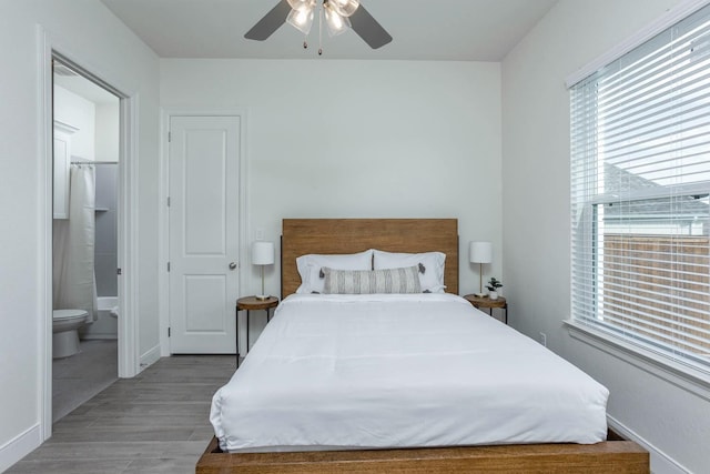 3316 Acorn Hill Trl, Weatherford, TX 76087 - bedroom featuring light wood-style flooring, connected bathroom, baseboards, and a ceiling fan