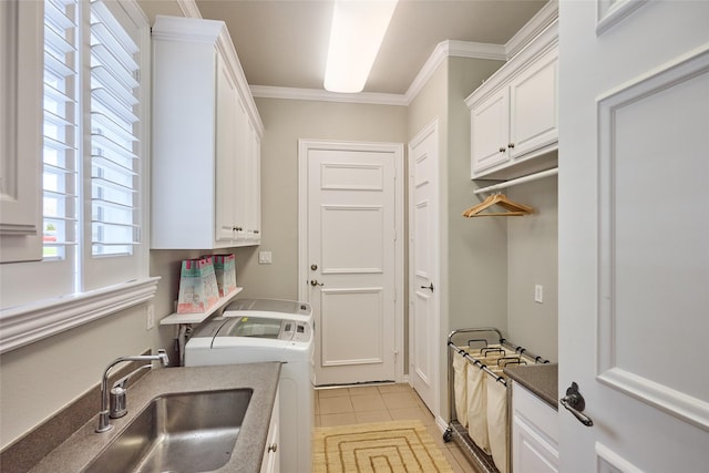3 Savannah Ridge Dr, Frisco, TX 75034 - washroom with separate washer and dryer, ornamental molding, light tile patterned flooring, and cabinet space