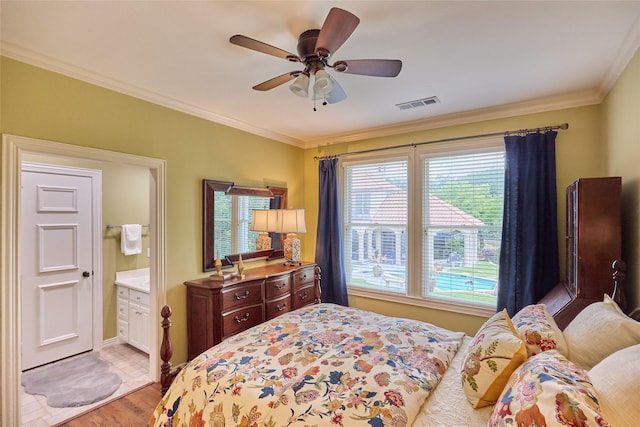 3 Savannah Ridge Dr, Frisco, TX 75034 - bedroom featuring wood finished floors, crown molding, a ceiling fan, and ensuite bathroom