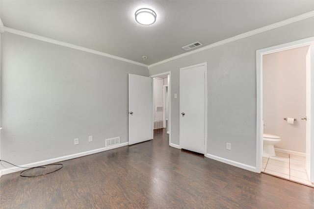 729 Grubb Cir, Mesquite, TX 75149 - unfurnished bedroom with ornamental molding, wood finished floors, baseboards, and connected bathroom