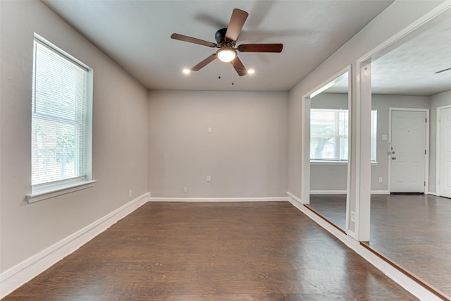 729 Grubb Cir, Mesquite, TX 75149 - empty room with a ceiling fan, dark wood finished floors, and baseboards