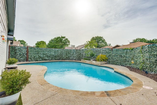 605 Sevilla Dr, Garland, TX 75043 - view of pool with a fenced backyard