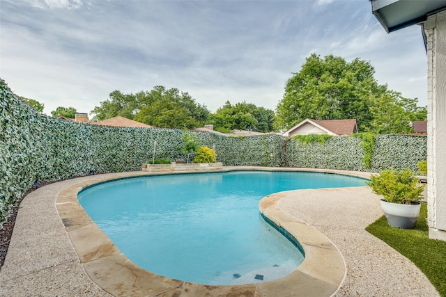605 Sevilla Dr, Garland, TX 75043 - view of swimming pool with a fenced backyard