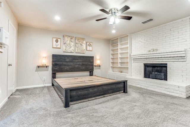 605 Sevilla Dr, Garland, TX 75043 - carpeted bedroom featuring a fireplace, baseboards, and ceiling fan