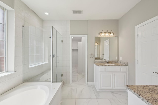 2545 Sedalia Ct, Frisco, TX 75034 - bathroom with a shower stall, marble finish floors, a garden tub, vanity, and recessed lighting