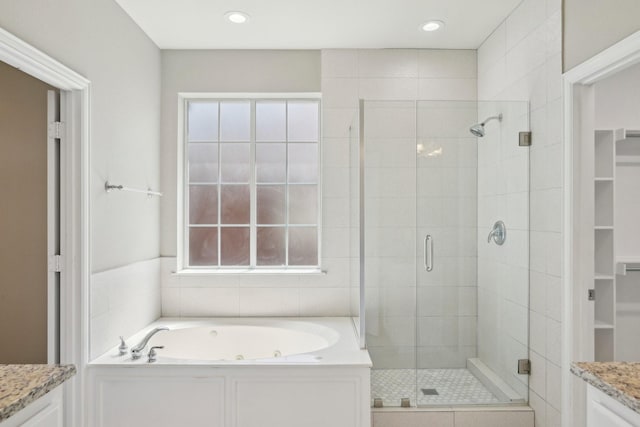 2545 Sedalia Ct, Frisco, TX 75034 - full bath featuring a stall shower, vanity, a tub with jets, a walk in closet, and recessed lighting