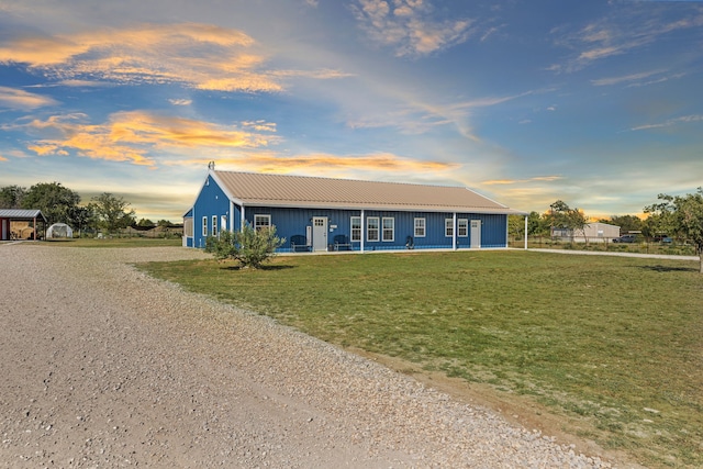 179 Johnston Dr, Decatur, TX 76234 - view of front of house with a yard, board and batten siding, and driveway