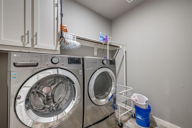 410 Phillips Ct, Mansfield, TX 76063 - laundry area with independent washer and dryer, baseboards, cabinet space, and wood finished floors