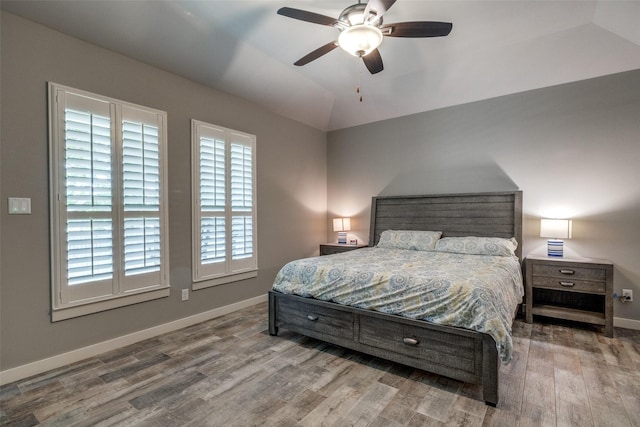 410 Phillips Ct, Mansfield, TX 76063 - bedroom with wood finished floors, baseboards, lofted ceiling, and a ceiling fan