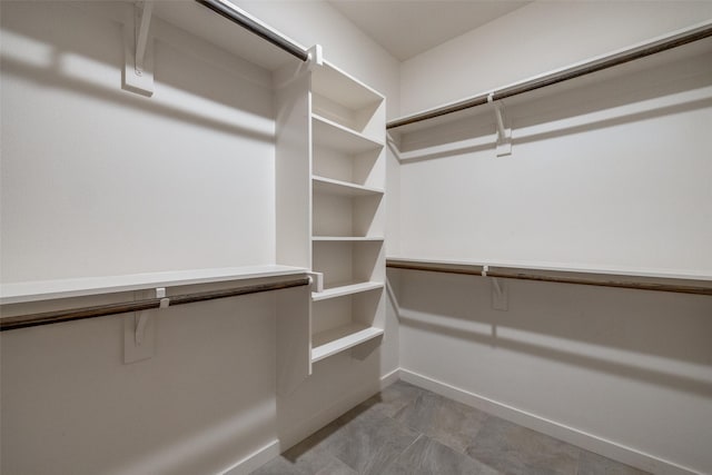 410 Phillips Ct, Mansfield, TX 76063 - spacious closet with light tile patterned floors