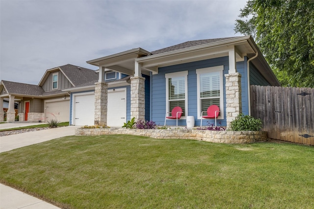 410 Phillips Ct, Mansfield, TX 76063 - view of front of house featuring concrete driveway, a garage, stone siding, and roof with shingles