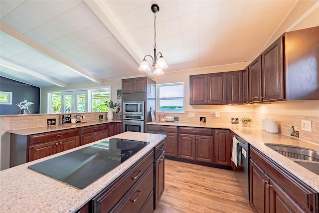 152 Pin Oak, Mabank, TX 75156 - kitchen with stainless steel appliances, plenty of natural light, light wood-style flooring, decorative backsplash, and beamed ceiling