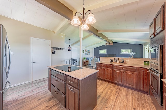 152 Pin Oak, Mabank, TX 75156 - kitchen featuring stainless steel appliances, light wood-style floors, a ceiling fan, a kitchen island, and pendant lighting