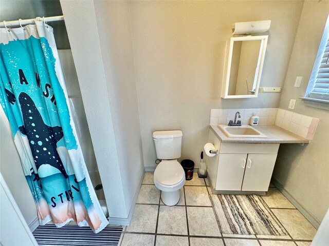 1407 Lady Amber Ln, Granbury, TX 76049 - full bathroom featuring a shower stall, tasteful backsplash, toilet, and vanity