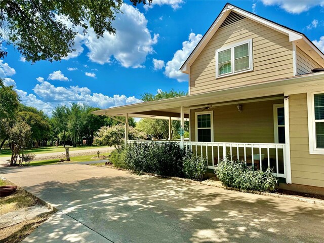 1407 Lady Amber Ln, Granbury, TX 76049 - view of home's exterior featuring a porch