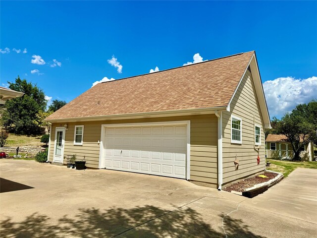 1407 Lady Amber Ln, Granbury, TX 76049 - view of property exterior featuring a shingled roof