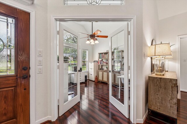 104 Lost Oaks Dr, Waco, TX 76705 - entryway with french doors, dark wood-style floors, baseboards, and ceiling fan