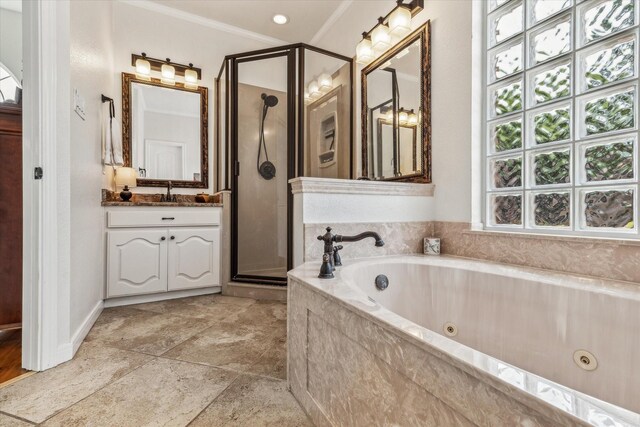 104 Lost Oaks Dr, Waco, TX 76705 - full bath with a shower stall, crown molding, vanity, a tub with jets, and stone finish flooring