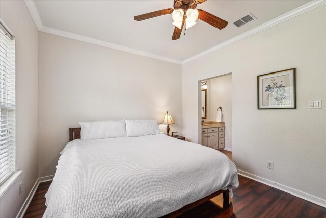 104 Lost Oaks Dr, Waco, TX 76705 - bedroom featuring dark wood-type flooring, crown molding, baseboards, ensuite bath, and a ceiling fan