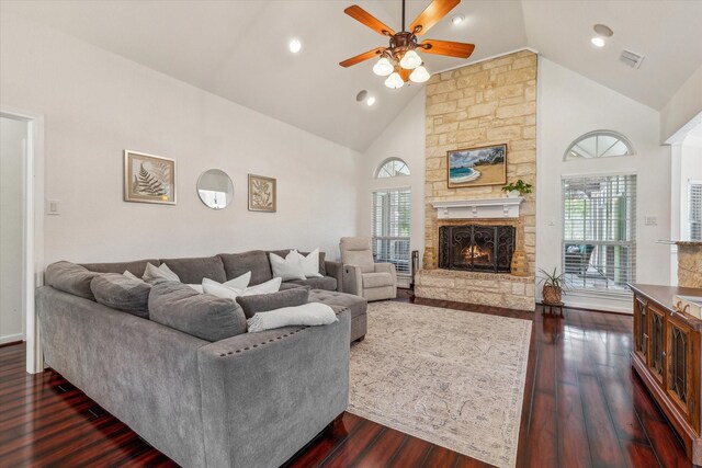 104 Lost Oaks Dr, Waco, TX 76705 - living room featuring a ceiling fan, healthy amount of natural light, high vaulted ceiling, dark wood-type flooring, and a fireplace